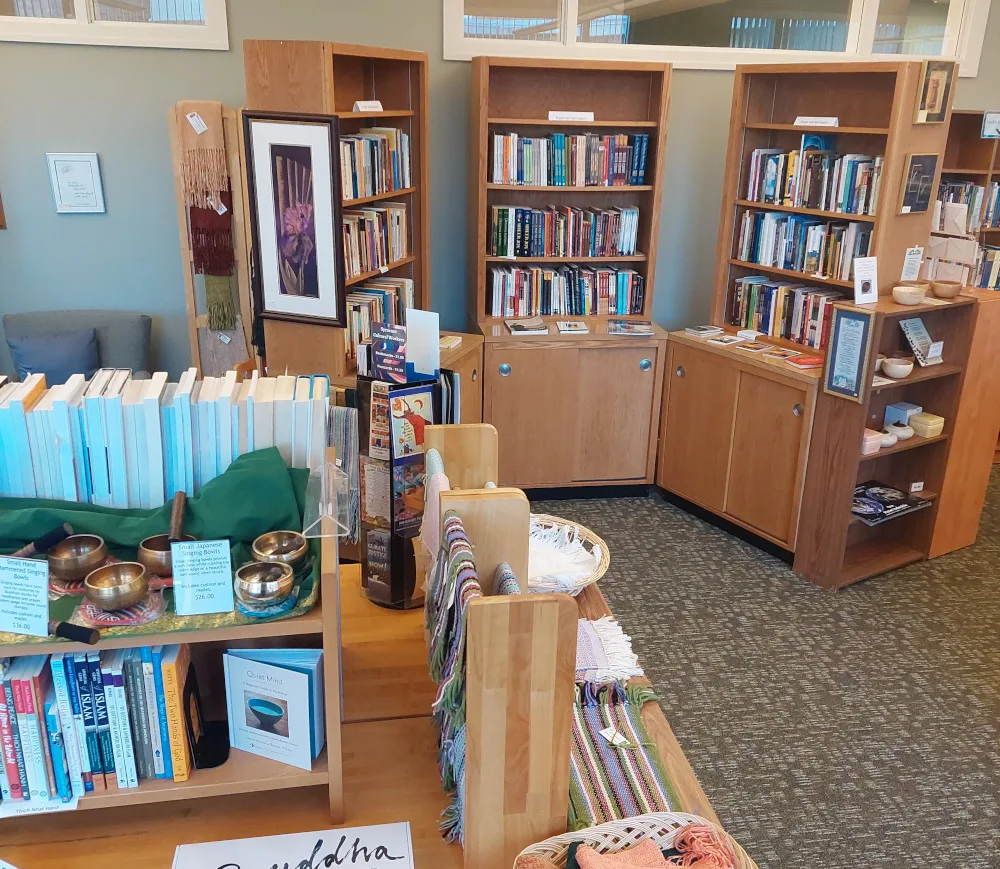 books, art work, singing bowls and other items available in the bookstore of a spiritual retreat center